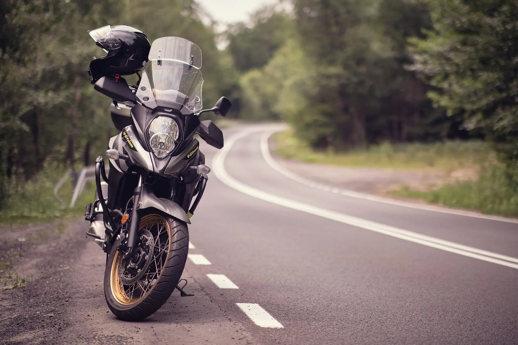 Adventure motorcycle parked at the roadside